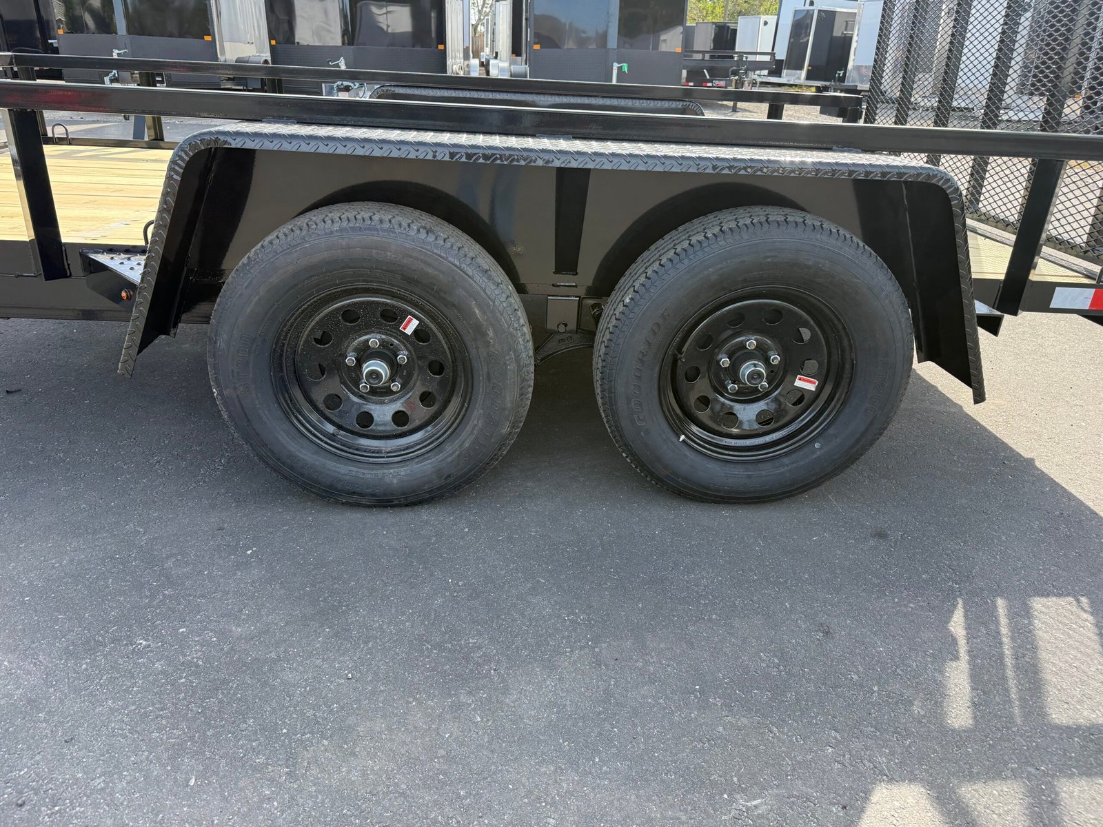 2026 DOWN2EARTH 6X12 TANDEM AXLE UTILITY TRAILER WITH BAR SIDING AND 48″ GATE - Image 3