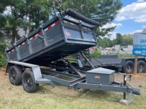 5′ x 10′ – 24″ Single Ram Dump Trailer With Sidewalls